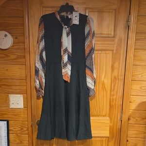 TULIP B Elegant Long Sleeve Dress with Patterned Sleeves and Pockets